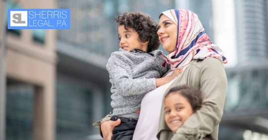 mom hugging children