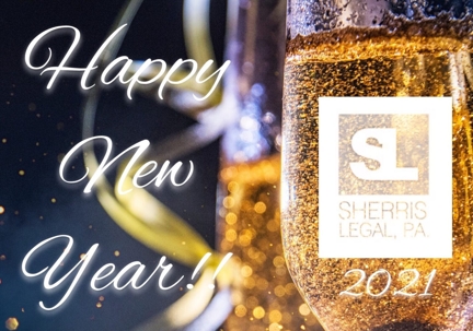 Glass of champagne with the words happy new year.